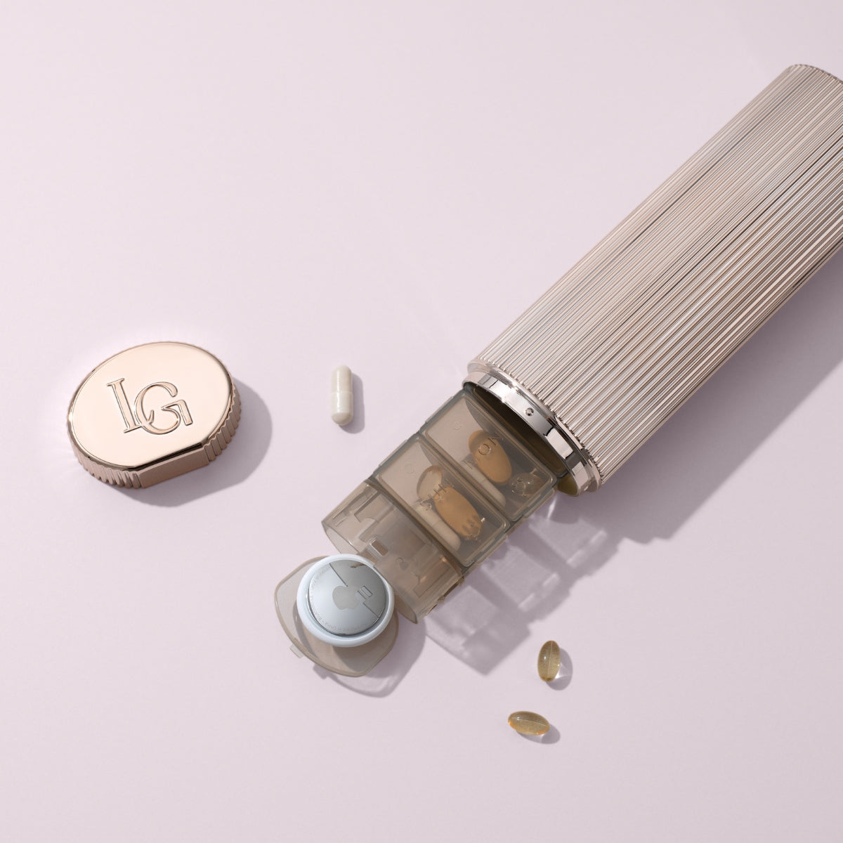 Pill box with AirTag slot — compact weekly organiser